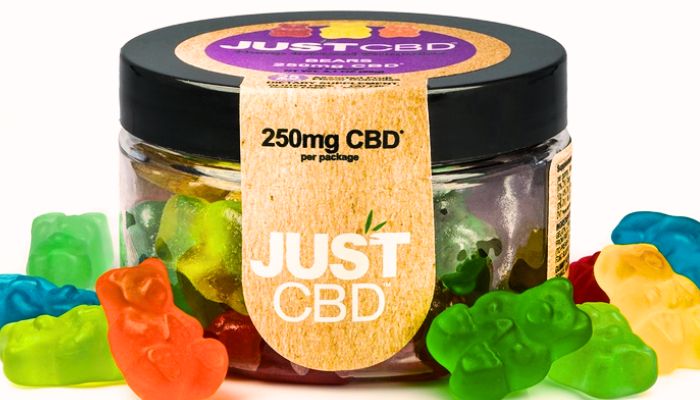 CBD gummies with bottle of gummies in the middle