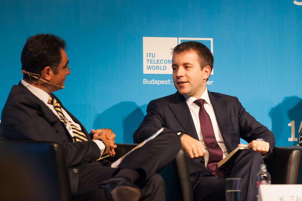 Speakers in conversation at a technology conference